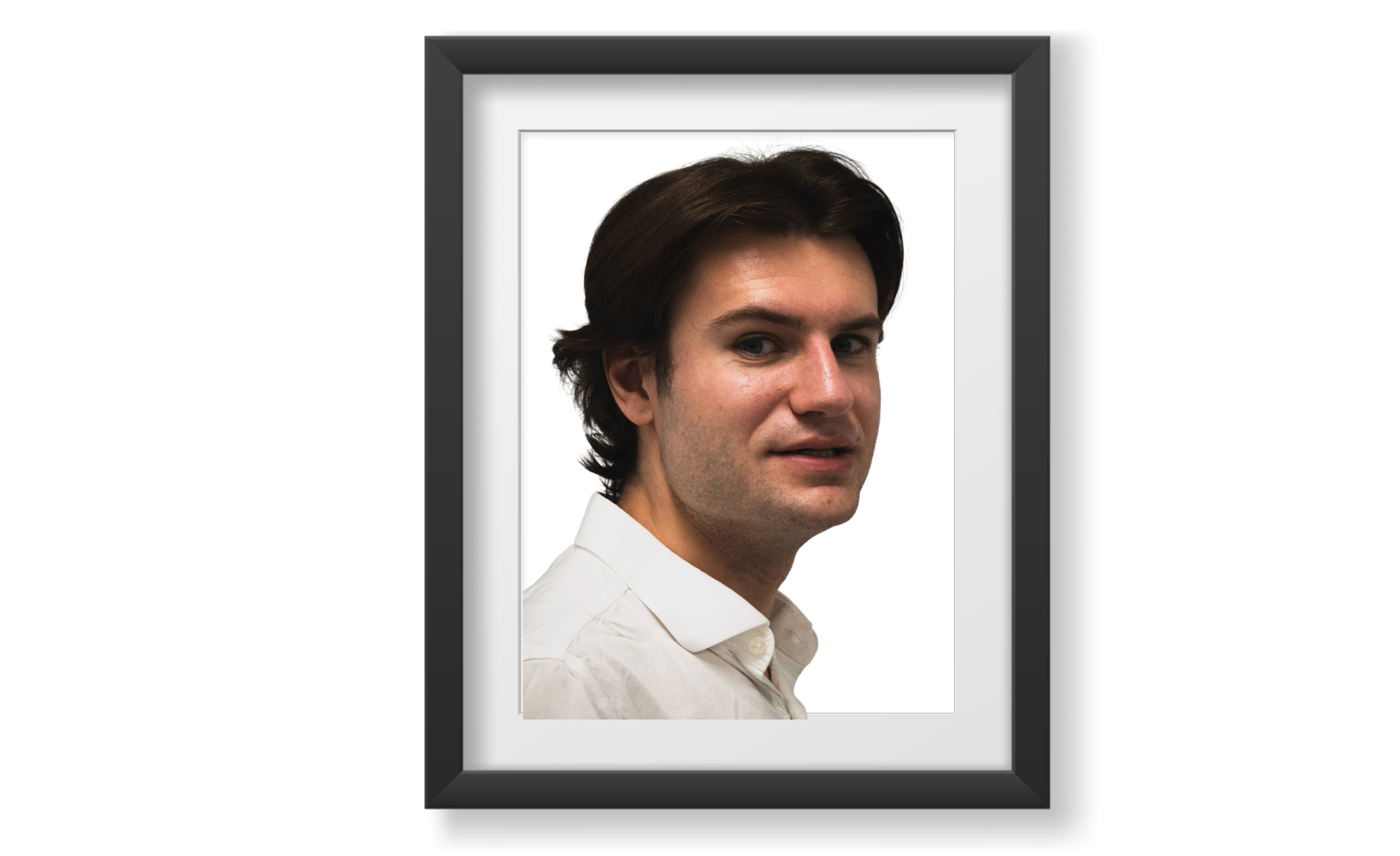 Caucasian young male with wavy brown hair, and blue eyes.