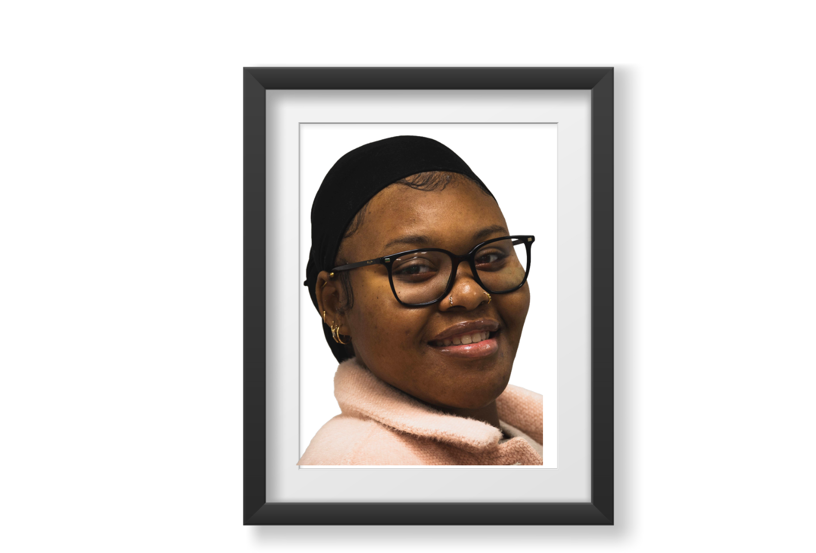 Makenzie is a young African American (Black) female with dark brown hair and brown eyes who is wearing dark framed glasses.